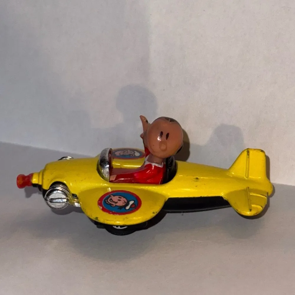 vintage 1980 Corgi Juniors Olive Oyl yellow airplane from the Popeye cartoon
